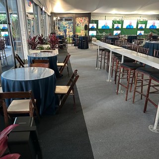 Event carpet installation with cocktail tables