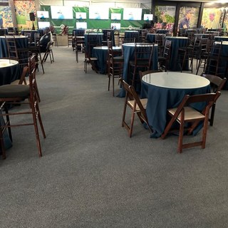 Event carpet installation in a hospitality tent for trade shows and convention centers